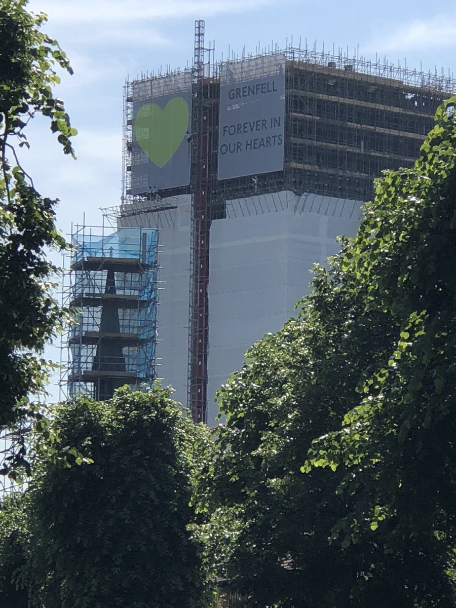 Banners going up in time for the anniversary, to ensure Grenfell Tower is not forgotten

"Grenfell Forever in Our Hearts" &amp; Green hearts 💚 message created at the request of the bereaved and survivors