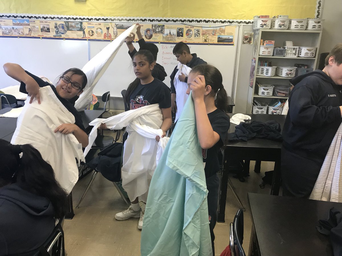 BaderBunch6's tweet photo. Learning to tie chitons is not as easy as you’d think! #baderbunch6 #GreekDay @PSA_Eagles https://t.co/3MgSUuKKe8