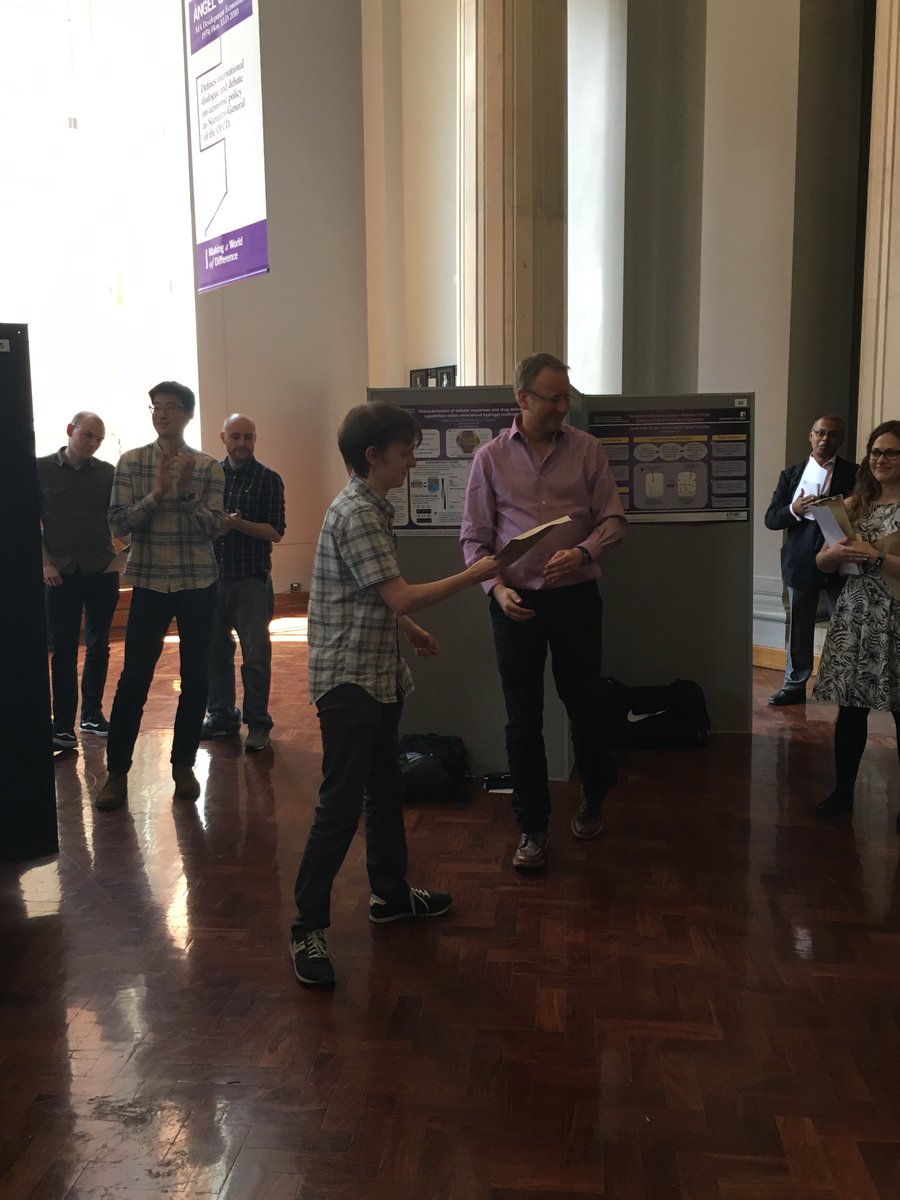 CDTFluidsLeeds's tweet photo. We have got our hands on some snaps from the cross-CDT Poster Event last month :) Here is our CDT student @FluidsTom getting his poster prize from Prof Andrew Gouldson! #cdtprize #posterevent #fluiddynamics https://t.co/jJgAy03PKz