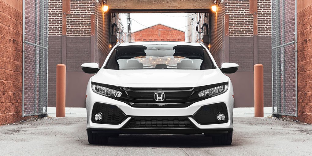 Honda's tweet photo. Explore without limits in the sleek and versatile 2018 #CivicHatchback. https://t.co/Q1V6uK5ZvR
