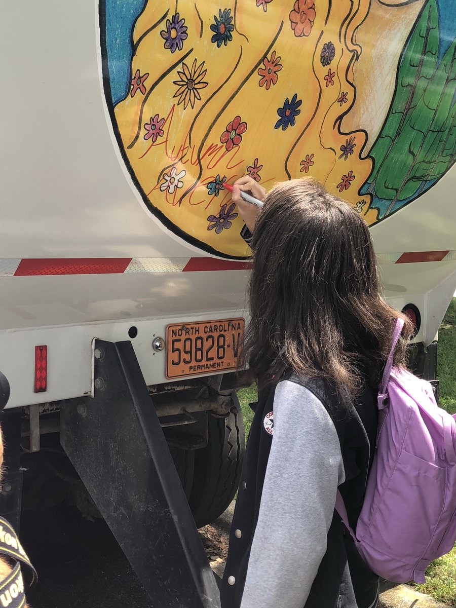 All four of our contest winners gave the trucks with their designs a personal touch today, providing not just the artwork, but their signatures, as well! Congratulations to these kids for their great work and we thank them for helping us spread the message to recycle!