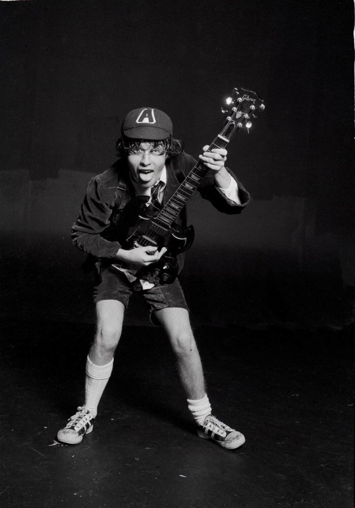 pdxsampson's tweet image. #UnpopularOpinion: as someone who deals with acute #hyperhydrosis, I hope this shorts-with-a-suit trend catches on to the point where it is fully acceptable. Shoutout to the OG: Angus Young.