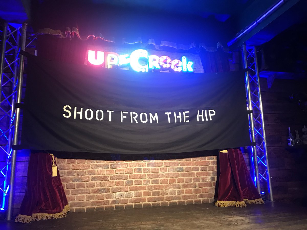 Always love an impromptu trip to <a href="/UTCComedyclub/">Up The Creek</a> to see <a href="/ShootImpro/">Shoot From The Hip</a>. Apparently there is a hole in the wall, behind a poster, behind this banner