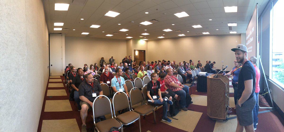 DeLanceS's tweet photo. @scottjeide and @patrickdodgen92 speaking to a packed house about the @tsheets way at #devopsdays #dodboise! https://t.co/VO7lLCpLNq