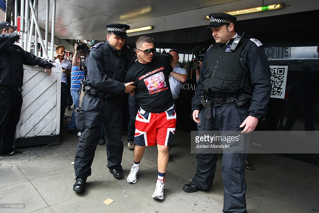 julianwheetland's tweet photo. Here's a picture of Tommy Robinson / Stephen Yaxley Lennon in action as a full on patriot! #SaveStephenLennon #JailPaedos #ArrestedAgain https://t.co/aKtVoitO5l
