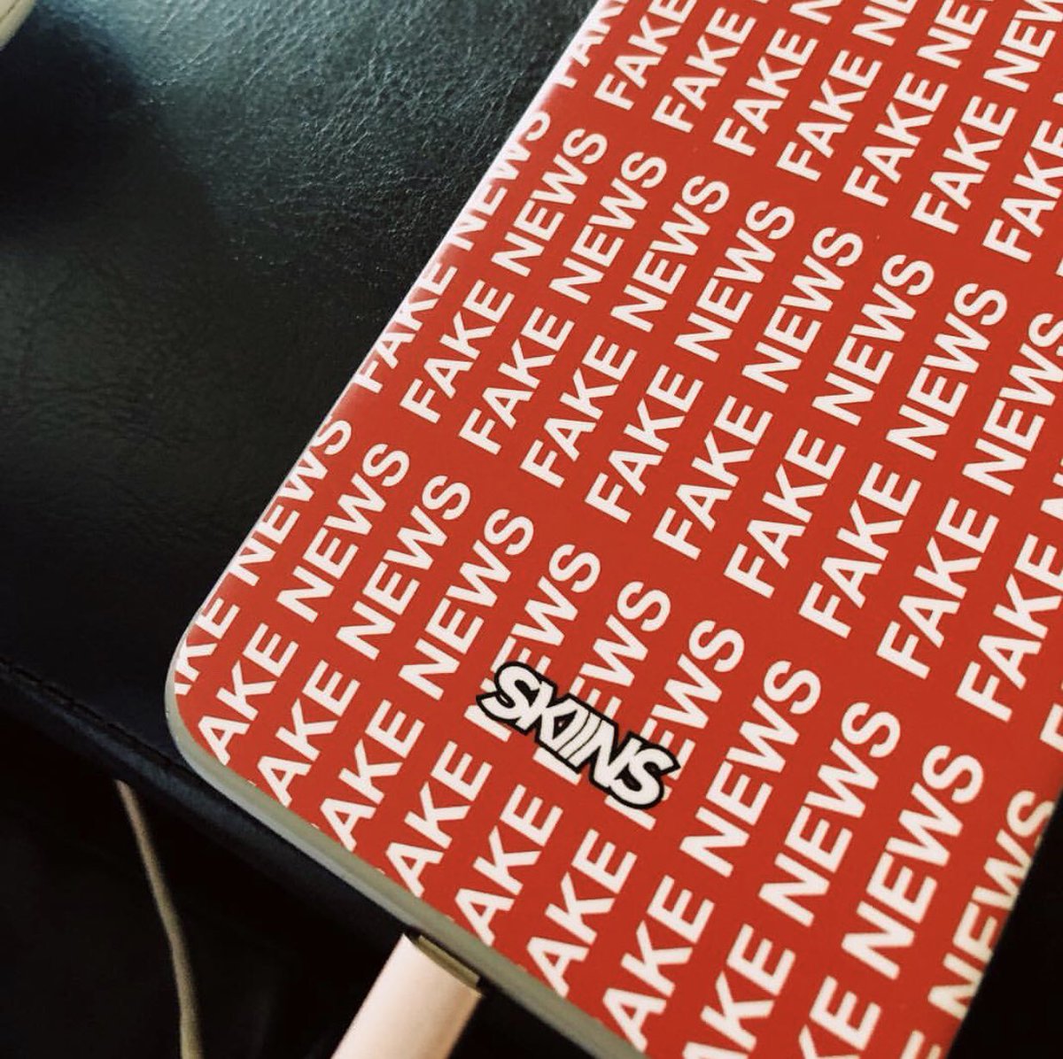 SkiinsLLC's tweet photo. Do you have an iphone skin? #fakenews #skiins #iphone https://t.co/AUkOo2sQBW