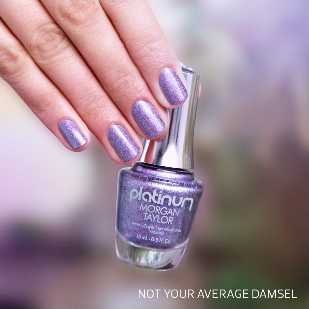 MTMorganTaylor's tweet photo. Looking for a gorgeous NEW shade? Try this eye-catching purple holo-sparkle from the Journey to Wonderland collection! Available now for a limited time at select CosmoProf stores. Color Shown: Not Your Average Damsel #MorganTaylor #HolographicNails #holover https://t.co/u8FjOBA672