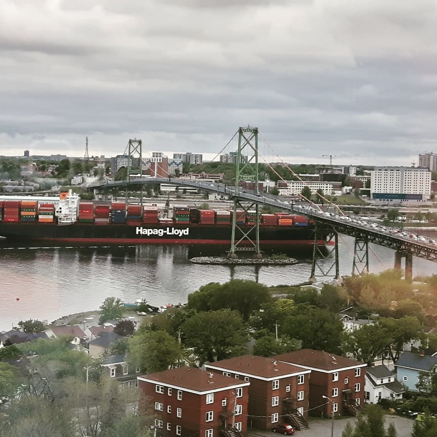 ericeric013's tweet photo. Not a bad view from the #capstoneprojectsolutions office. My view tonight while on a conference call. #Halifax is not a bad place to work. #bigshiplittlebridge #portcity #capstoneprojectsolutions https://t.co/ksykWFdNIn