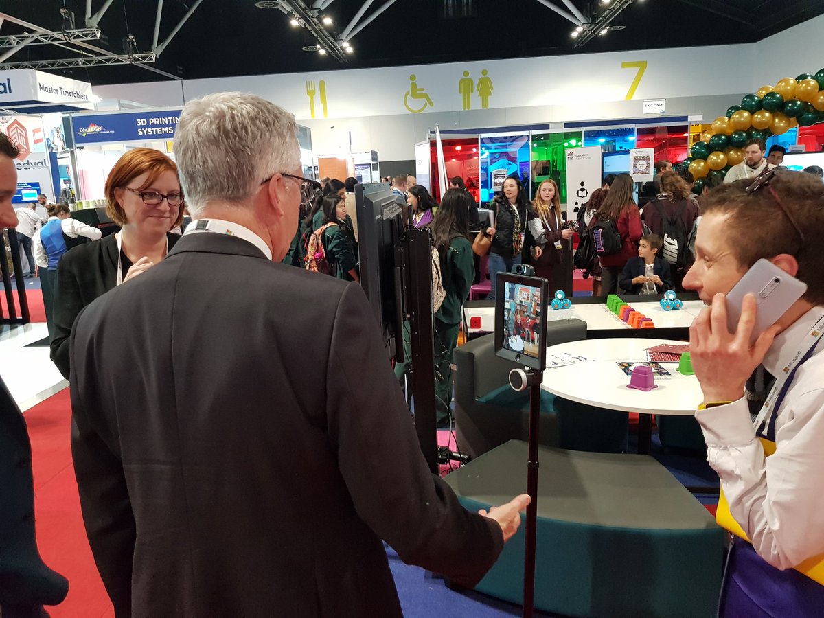 learnPSNSW's tweet photo. Mark Scott talking to Armidale High School who are attending #EduTechAU via live stream on a 'Double' screen on wheels! https://t.co/g3Q2yyTkd6