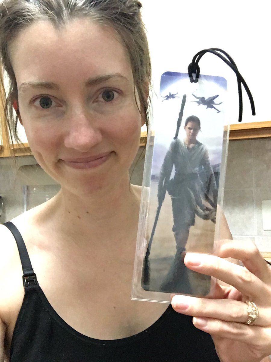 ...and then the husband comes home and says, "I brought you one of my backup bookmarks so you have one to use."