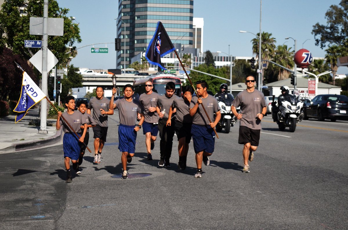 LAPDwestvalley's tweet photo. #LAPD West Valley #officers, #cadets, Jr police and #volunteers teamed up to run the Special Olympics Torch Run yesterday! Nice support from our #community members as we ran. Awesome #teamwork, everyone! Oorah!
.
.
#wval #lapdwval #police #specialolympics #run https://t.co/kPIVnESoCl