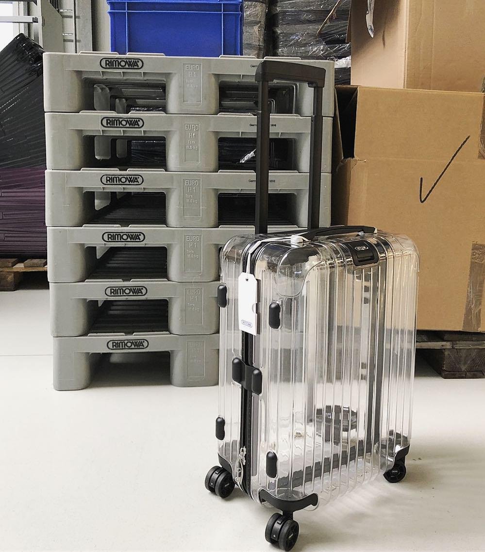 off white luggage transparent