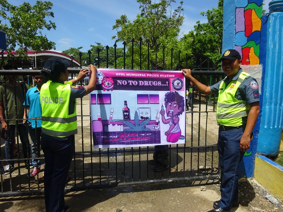 OPOLMPS's tweet photo. HANGING OF TARPAULIN RE: INTENSIFIED CAMPAIGN AGAINST ANTI-ILLEGAL DRUGS @ OPOL NATIONAL SECONDARY TECHNICAL SCHOOL (ONSTS) https://t.co/r2ByaVHmaQ