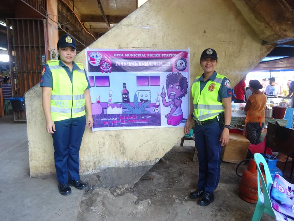 OPOLMPS's tweet photo. HANGING OF TARPAULIN RE: INTENSIFIED CAMPAIGN AGAINST ANTI-ILLEGAL DRUGS @ OPOL PUBLIC https://t.co/BJfT3aMehX