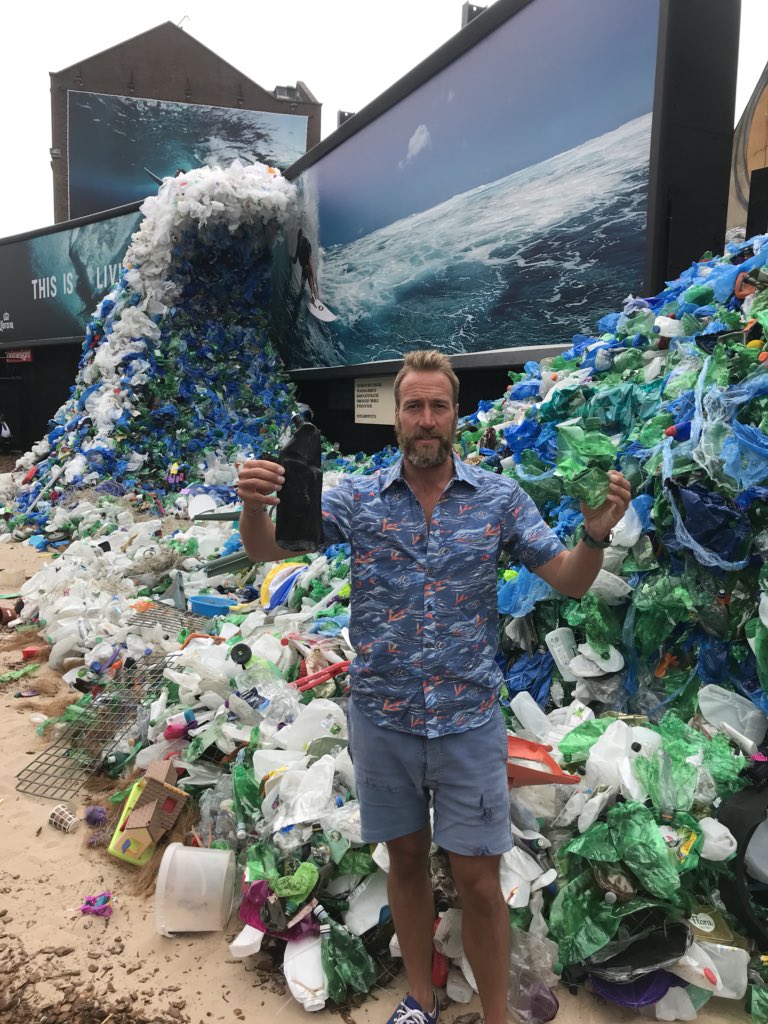 Benfogle's tweet photo. Today I helped @corona launch the #100islandsprotected with @parleyxxx to safeguard paradise. This is the ‘wave of waste’, 1200kg of plastic, the amount found on every 2 miles of beach in the U.K. My Hawaiian shirt is made from recycled ocean plastics. https://t.co/GPqZ58IKOr #ad https://t.co/DqqQfdWmZd