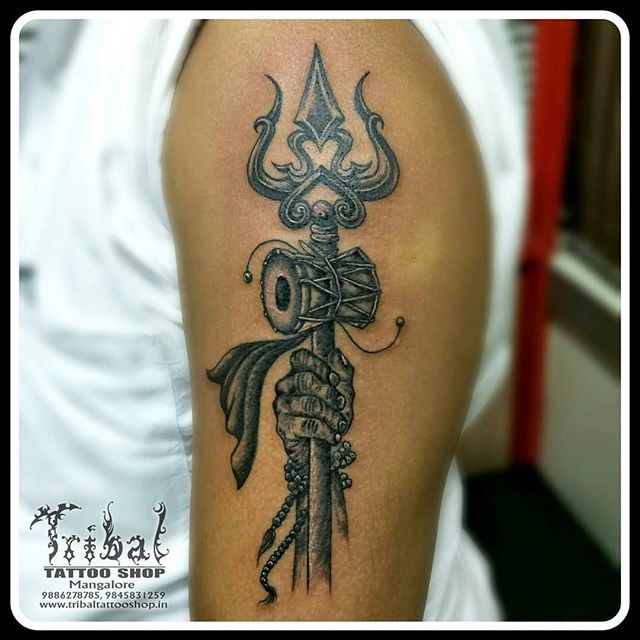 Small om and trishul tattoo done at xpose tattoos jaipur