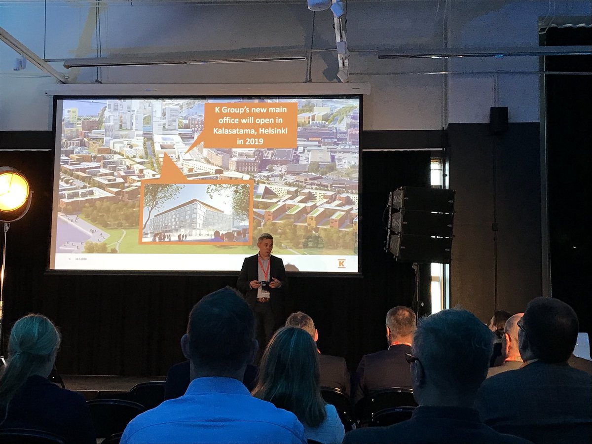 KenDooley's tweet photo. We aren’t designing buildings we are facilitating the perfect work day. “The building will be a platform for people to meet” Day 2 of #smartbuildingfi kicks off with @jussim_ from @kryhma talking about their new HQ. @GranlundOy are lucky to be part of the design team https://t.co/i4HUqvYHWC