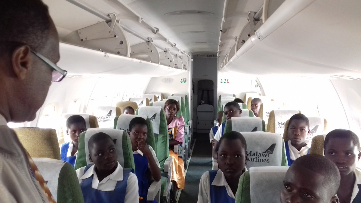 MalawiAirlines's tweet photo. Our First Officer Lusekelo Mwenifumbo took time off flying to interact with girls drawn from various schools under Community Integrated Intervention Project (CIIP) at KIA in Lilongwe. 
#flyMalawiAirlines
#FromTheWarmHeartofAfrica
#www.malawian-airlines.com https://t.co/uUkRsSUCOR