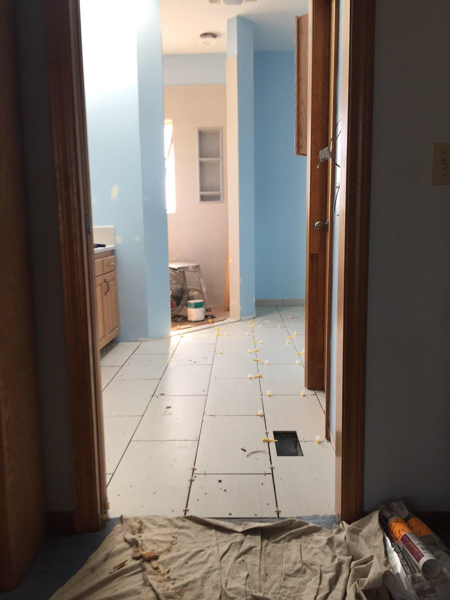 RenovationMD's tweet photo. Update on our bathroom remodel.

New vanity and lighting has been installed,
Paint is finished, aside from a few minor touch ups, flooring is almost complete, and the shower has been completely framed and is almost finished.

#lawrenceks #local #contractor #remodel https://t.co/I955RLhC33