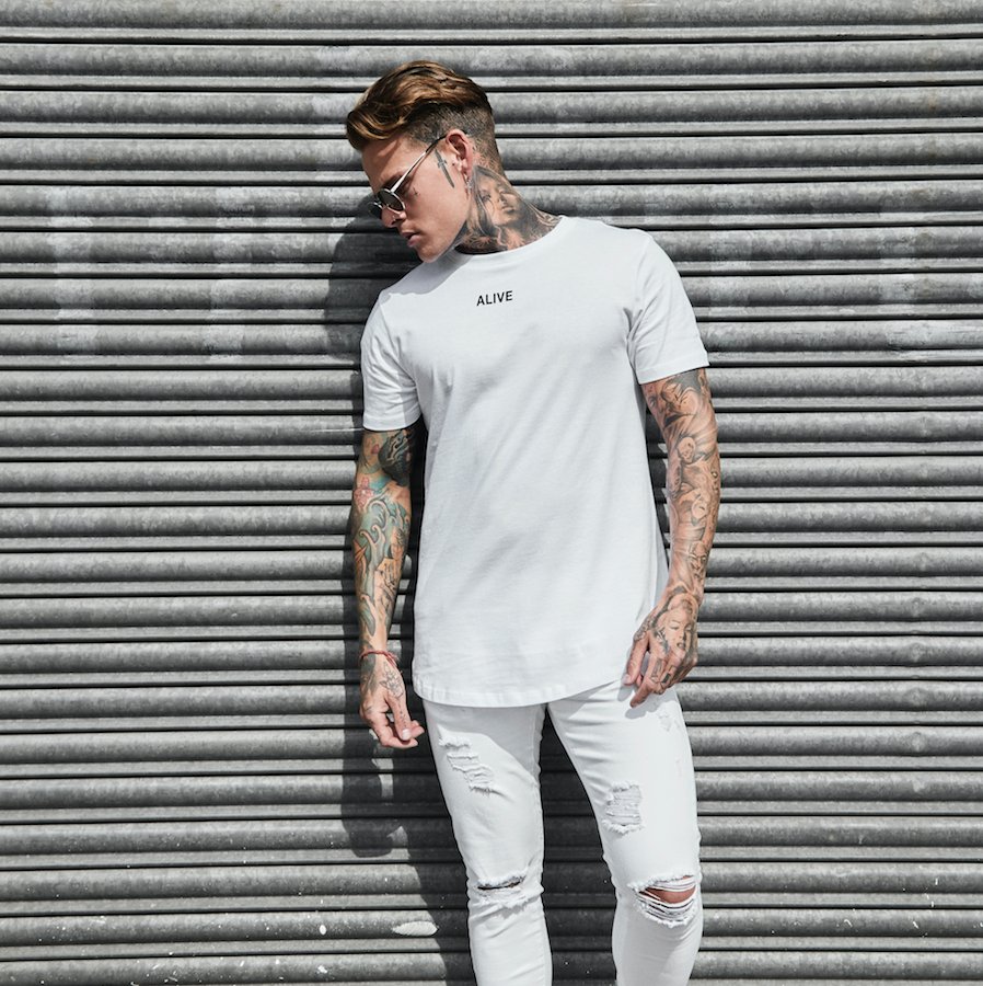 ALIVE Micro Curved Hem Tee Paired With The White Worn Jeans. 

alivedenim.com