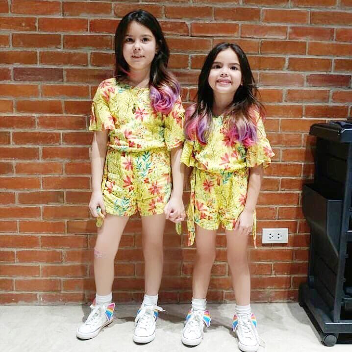 myrobbyrabbit's tweet photo. Why blend in when you were meant to shine! 💛💓💜 @kendraandscarlett in their #RobbyRabbit #ComfyFloralRomper 👯♀️ https://t.co/r9kbFhY3wY