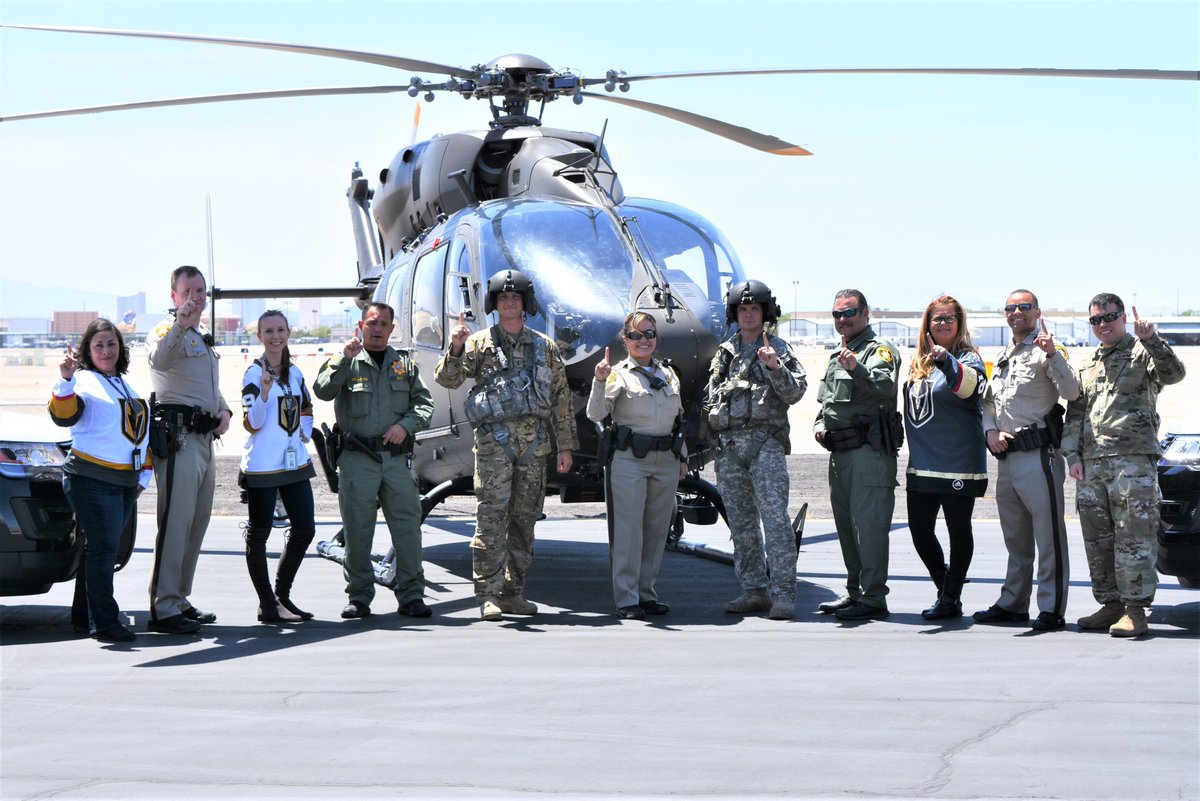 LVMPDBAC's tweet photo. bolden officers &amp; staff join forces with @NVNationalGuard 3/140th aviation unit to cheer on the @GoldenKnights to victory! we are behind you 100%! #3_140thaviation #goknightsgo #vgk #knightup #alldayallknights #goldenknights #vegasborn #vegasstrong #nocaps #boldenpride @ChanceNHL https://t.co/p55kkPPWM2