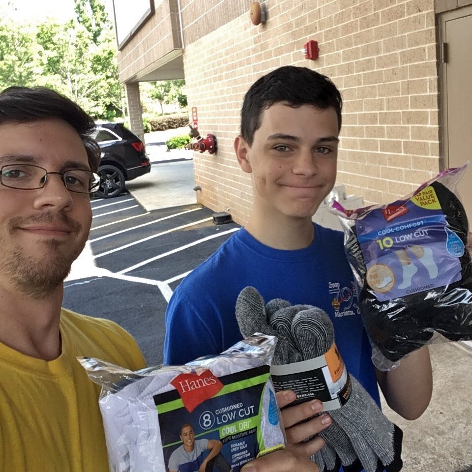 MUSTMinistries's tweet photo. Watch this young #EagleScout soar! Martin Sholl of Boy Scout Troop 795 held a concert for his Eagle Project and collected over 700 packs of brand new socks and underwear for residents of MUST's #ElizabethInn! We love to see young men learning how to #loveyourneighbor! https://t.co/8G3zs6ebAL