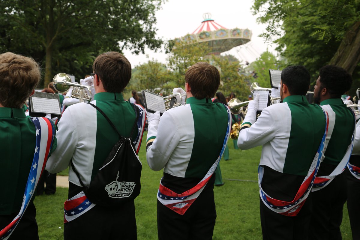 unccharlotte's tweet photo. The @PNNMB capped off its trip to France this week with a final performance in Paris, where the band cut loose at the Jardin d'Acclimatation, to the delight of the local audience. #UNCCNormandy https://t.co/oTTzd0gKO5