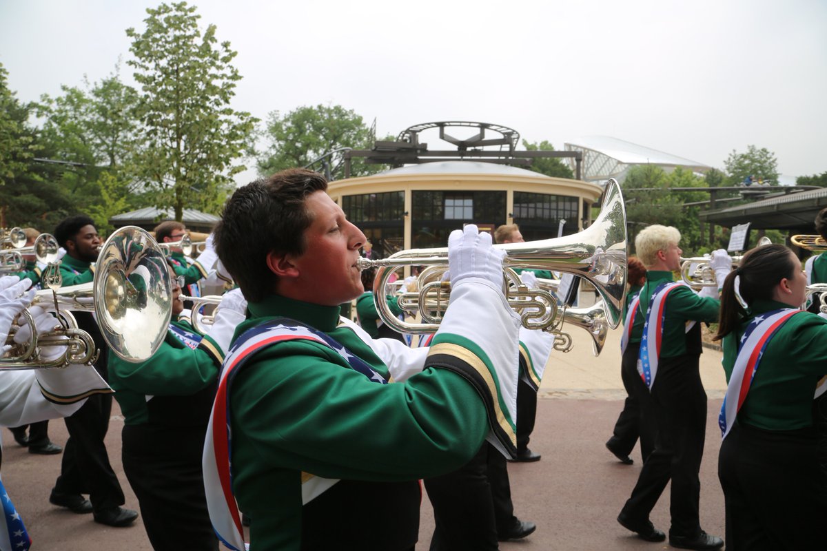 unccharlotte's tweet photo. The @PNNMB capped off its trip to France this week with a final performance in Paris, where the band cut loose at the Jardin d'Acclimatation, to the delight of the local audience. #UNCCNormandy https://t.co/oTTzd0gKO5