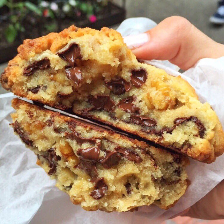 A balanced diet means having one cookie in each hand. Top 5 NYC treats right here. See more on the Wine n Dine app. #foodie #nyc <a href="/levainbakery/">Levain Bakery</a>