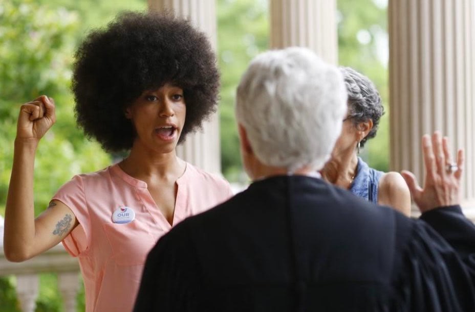 moorbey's tweet photo. Athens, Georgia’s New County Commissioner Took Her Oath Of Office Over ‘The Autobiography Of Malcolm X’ While Rocking The Flyest ‘Fro https://t.co/r6Mx7soAei https://t.co/VGEuxT8dM0