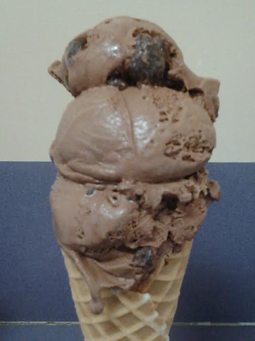 Today is National Chocolate Ice Cream Day!!!  $1.00 off any chocolate bases ice cream cone at Sweet Temptations!!