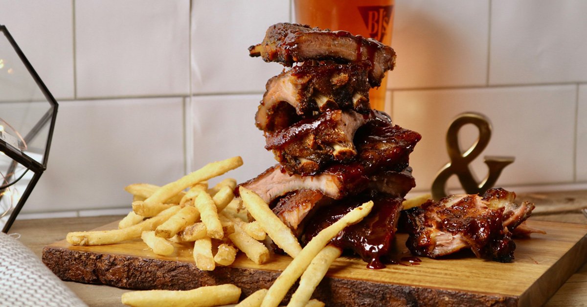 A RIBDICULOUS deal. Just $18.95 for a full rack, house salad, two signature sides and a mini Pizookie® every Thursday.
