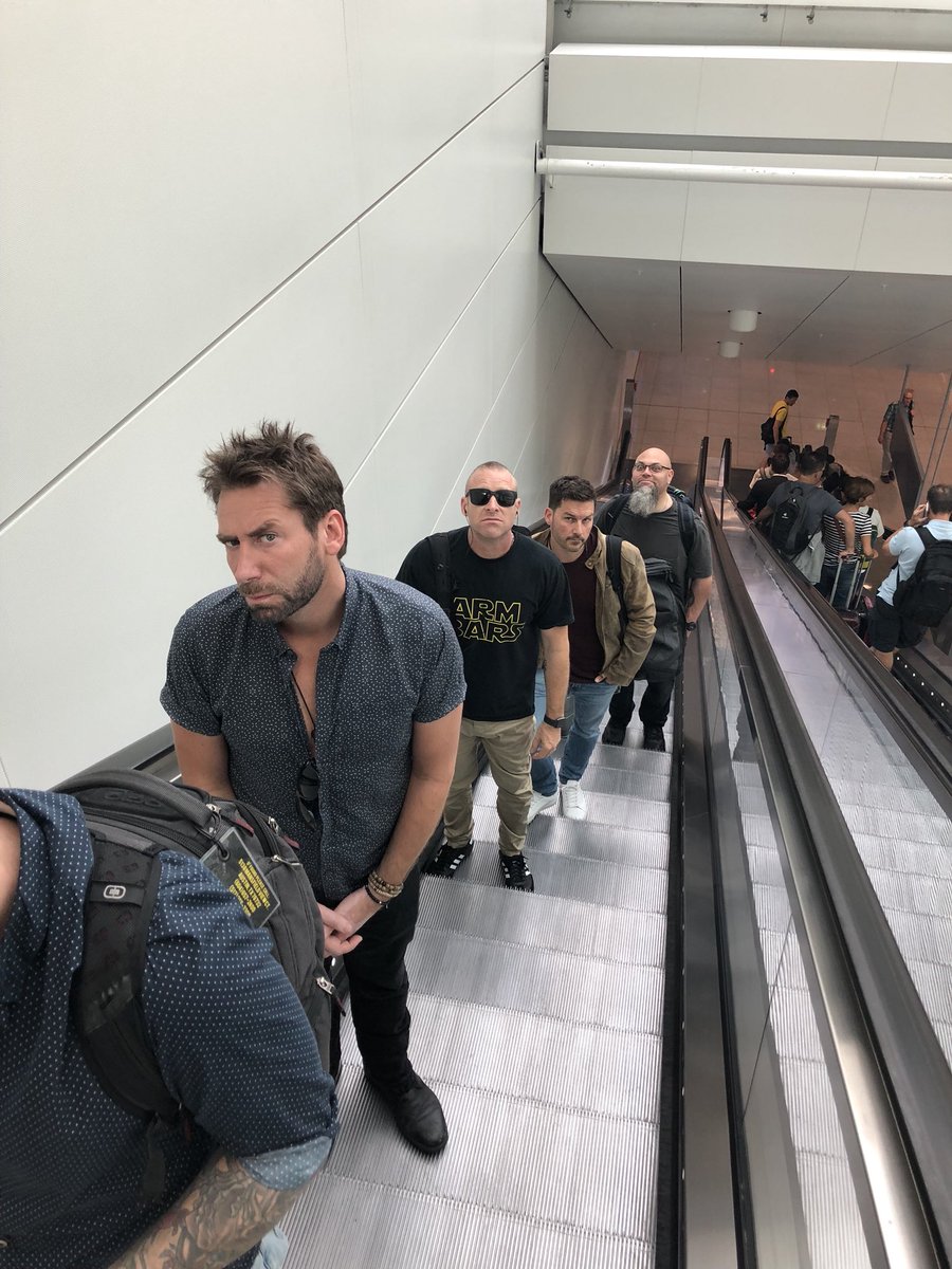 Nickelback's tweet photo. Escalator faces. https://t.co/Izjyf8MD23