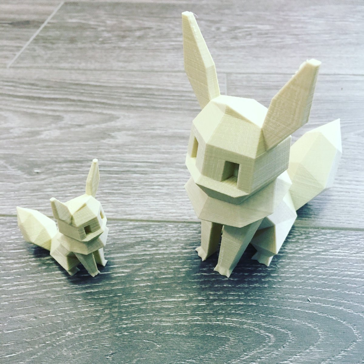 MakerWiz's tweet photo. Low Poly Eevee, big and small #3dprinting @makerbot @materio3d #sandybeige #3dmodel @flowalistik #pokemon #gottacatchemall https://t.co/Rhkxbhib2p