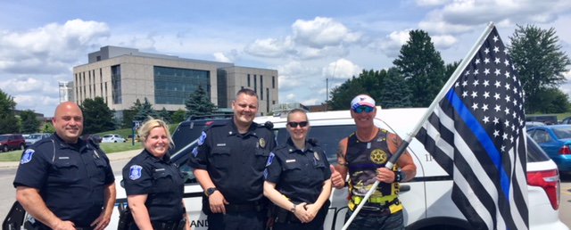GVSUPolice's tweet photo. We had the privilege of escorting @KentSheriff Deputy Garbarino as he continues his #RunAcrossMichigan as he made his way through campus today.  Keep it going, Deputy Garbarino!! https://t.co/rKJLLn9i8F
