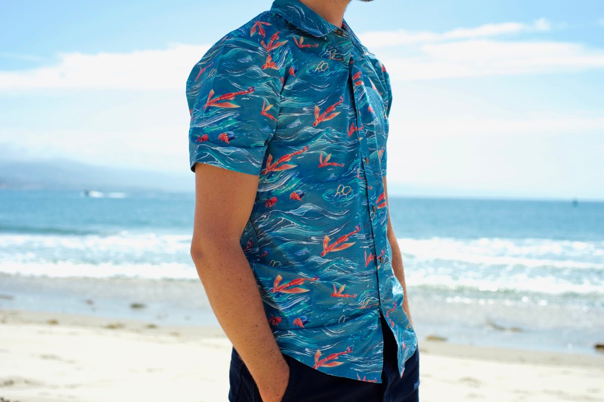CreativeReview's tweet photo. Beer brand @corona have created the shirt, which is made using plastic harvested from the ocean. It’s designed to appear normal from far away, but on closer inspection reveals the types of plastic objects found in the sea and during beach cleanups https://t.co/S461wD2R16 https://t.co/IO4D0jGRel