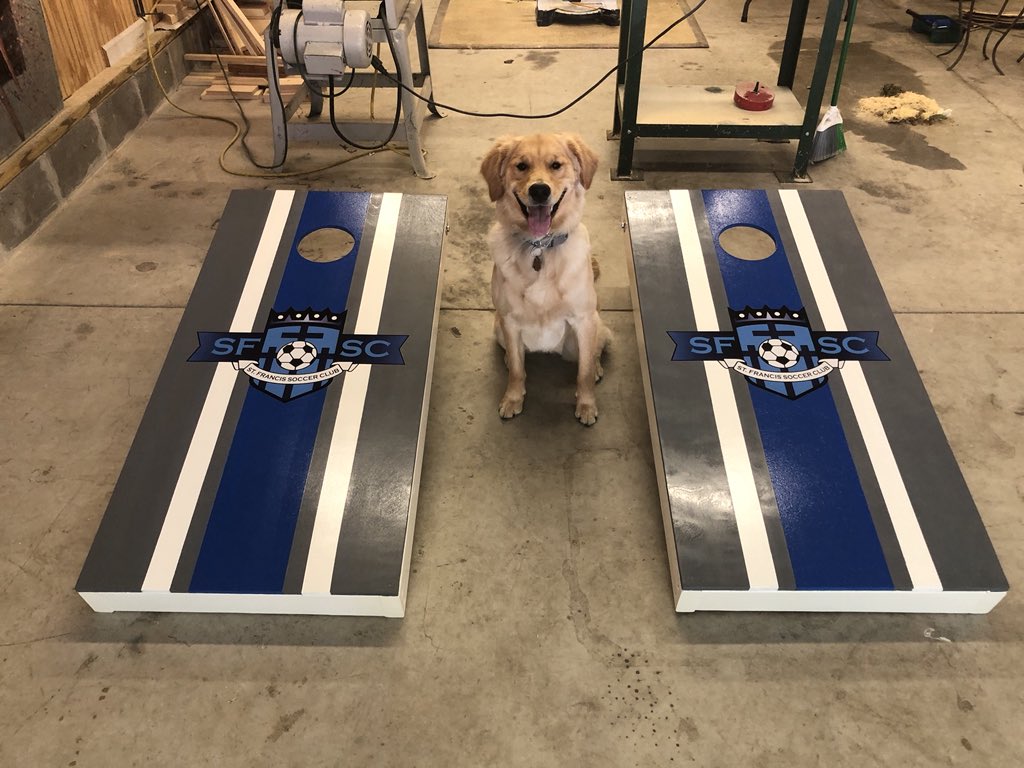 Ellie approved. Another custom piece getting ready to head out the doors! Corn hole boards are a must for summer fun!