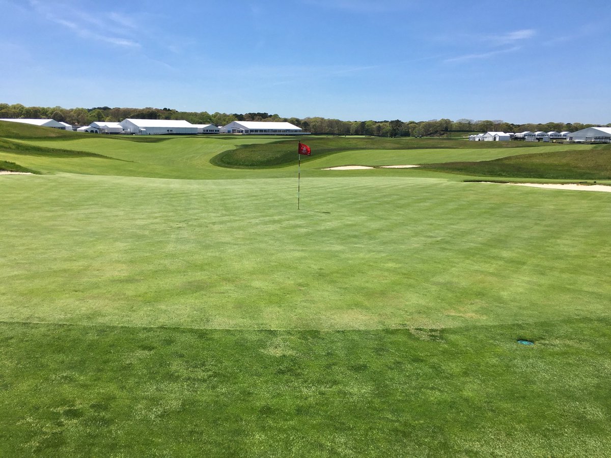 The U.S. Open par-4, No. 18 at Shinnecock plays at 485 yards from new back tees. 💪

Approach from 221-yards (large bunker ahead on left is 100-yards out).

Deep greenside bunker on right will get plenty of action. 🚨

Green pitches from back to front (behind looking at fairway).