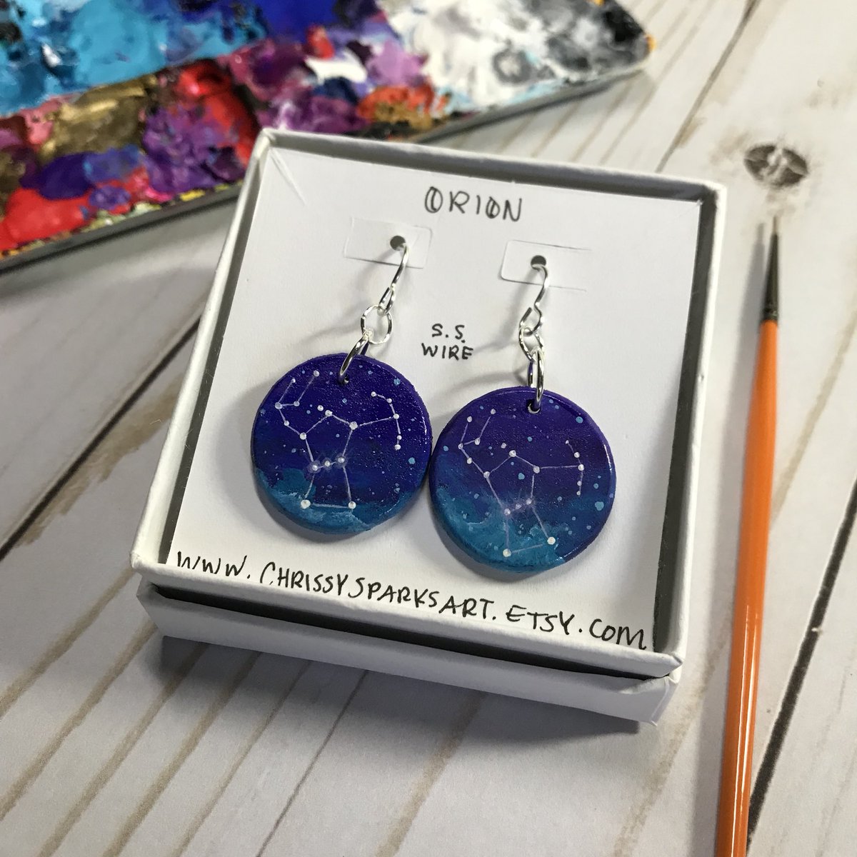 ChristinaFavre's tweet photo. Orion Earrings - these were at the @startorialist booth during #AAS232.
I loved working on these mini paintings! #astroart #sciart #constellation #handmade #art https://t.co/R0UsD3Qft8