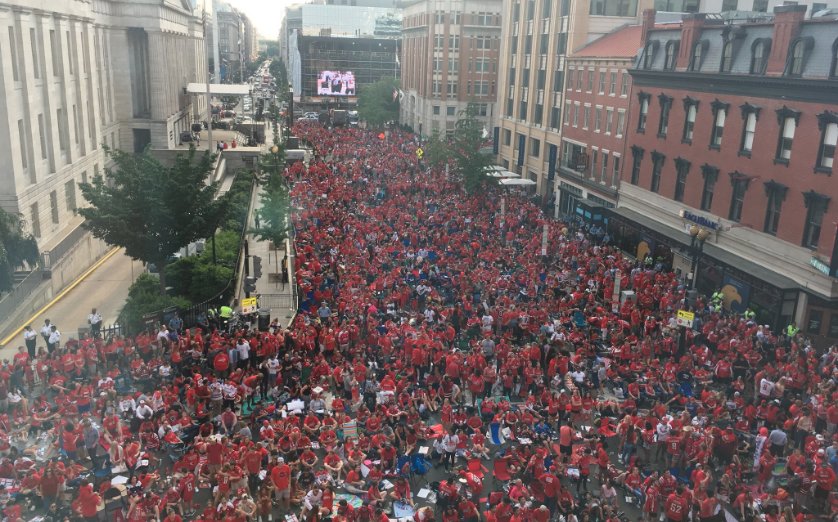 Deadspin's tweet image. D.C.'s Chinatown neighborhood is sinking under a sea of red tonight: deadsp.in/Ziucaga