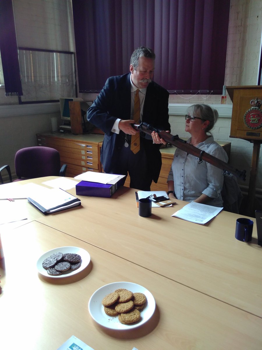 S_Colborne's tweet photo. Nothing to see here, just your average #ARAEM meeting, complete with biscuits and replica WW1 weapons... #archives https://t.co/MpIuYKlqDU