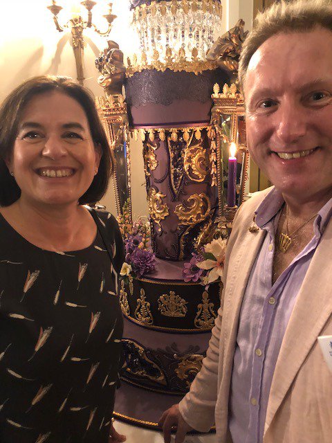 Celebrating U.K. Queen’s official birthday at the British Embassy. Admiring the amazing birthday cake with the cake maker.