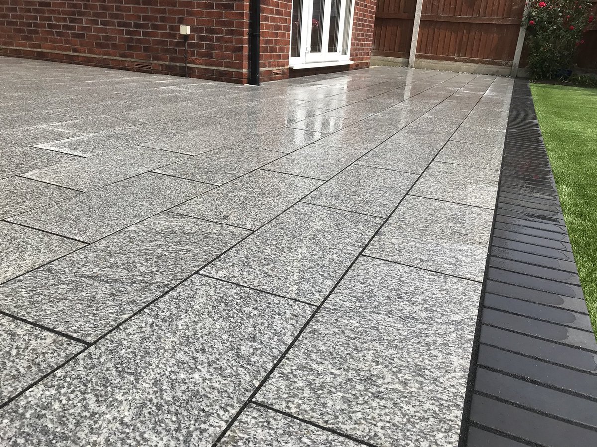 leeharveydesign's tweet photo. @BradstoneUK @Sarahhennem latest back garden design finished this week silver grey granite edged with blue engineering brick and new artificial lawn 👍🏻 https://t.co/PIw8j4R5IH