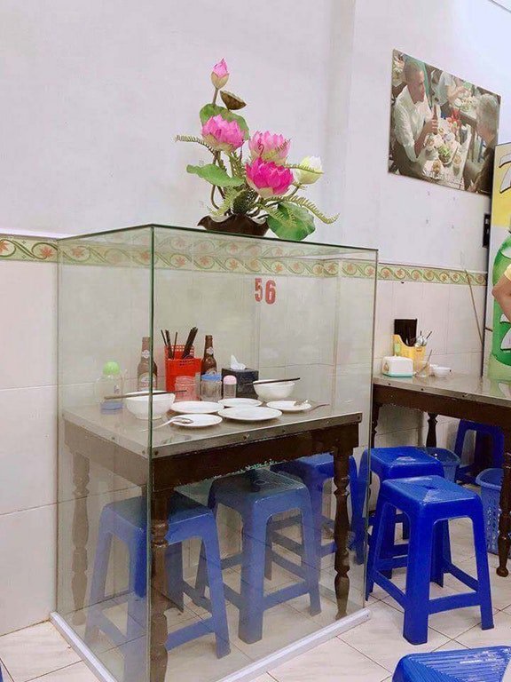 President Obama and Anthony Bourdain enjoy dinner and beer in Hanoi.

Fun fact: This restaurant in Vietnam was so honored by the visit, that they framed the table and stools.