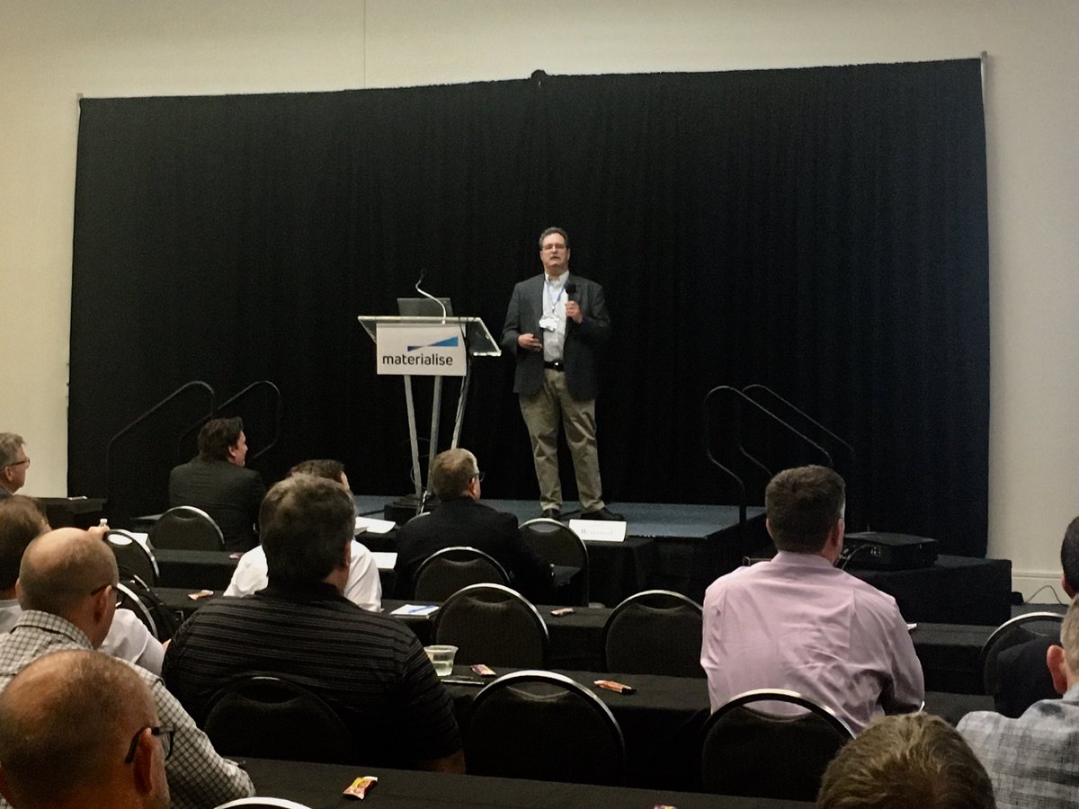 MaterialiseNV's tweet photo. Ed Tackett of @uofl walks #MaterialiseExperience attendees through the steps in #additivemanufacturing metal part production. https://t.co/ht0VCdisxb