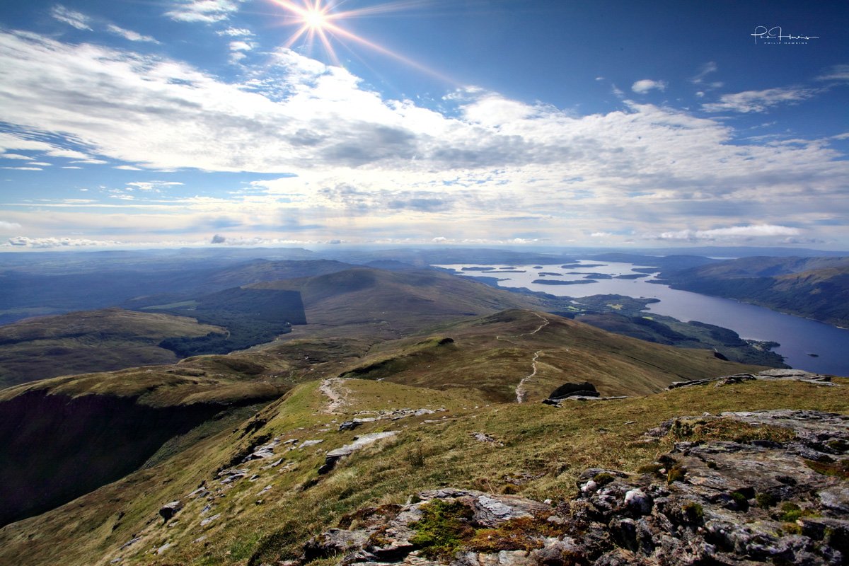 We hope your weekend has looked a little something like this! Great shot of Loch Lommond from Ben Lommond summit by 📷 <a href="/philiphawkins44/">Philip Hawkins Photography</a> #Highlands #visitscotland #lovescotland