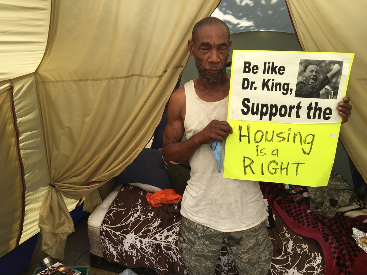 imastringbean's tweet photo. Urgent: Cops plan to evict tent encampment today. Need bodies here ASAP, corner I-147 and Chapel Hill St., Housing is a right! #DefendDurham #MoratoriumonEvictions https://t.co/T4aXuSe0q3