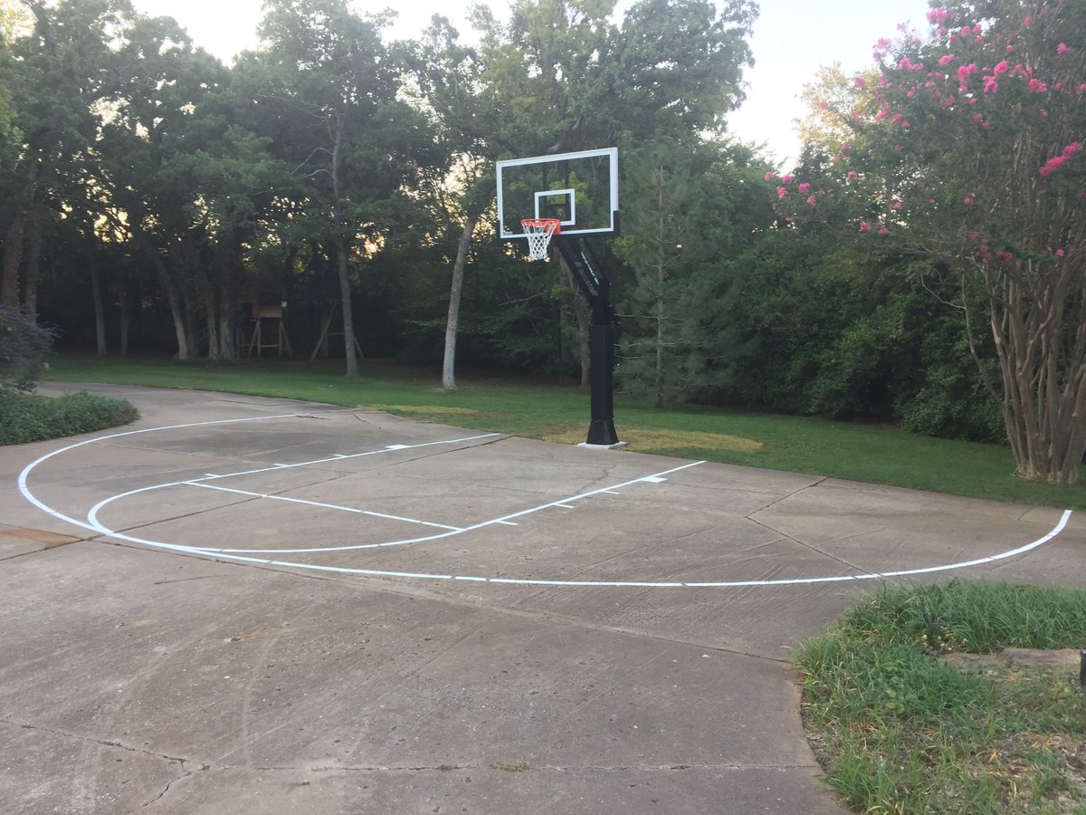 newstripe's tweet photo. @TulsaHoops  did a stellar paint job on this NCAA Basketball Court stencil for a residential project #GoStripe! https://t.co/olNWGrNC7D
