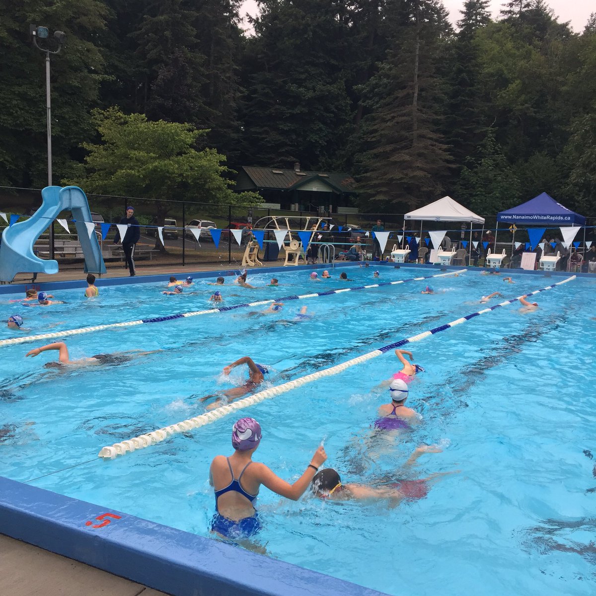 NWRSC's tweet photo. Business is booming at Mile Swim #2! #WhiteRapidsFast https://t.co/WwrJwPKlQG